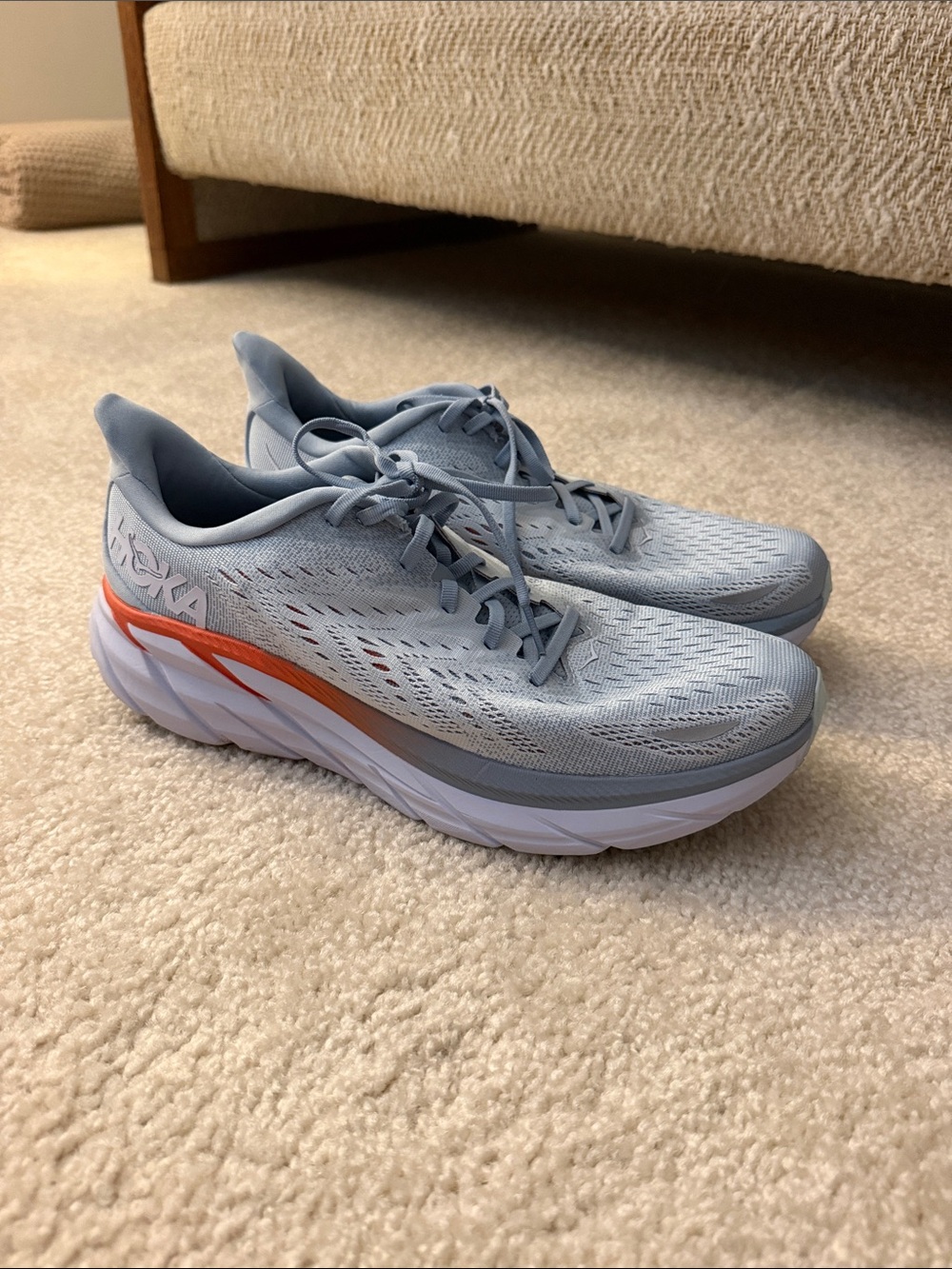 Hoka Womens Light Blue Sneakers with Orange Accent